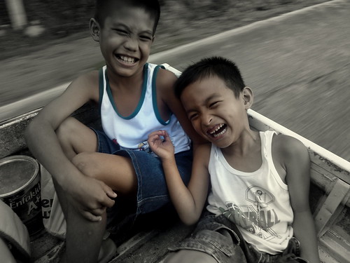 laughing boys in back of truck by leighblackall, on Flickr